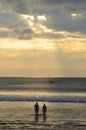 Couple Taking Last Dip at Sunset on Kuta Beach